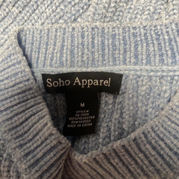 I am still selling a blue knitted sweater. It is very soft. It is a size medium. - Picture 3 of 3